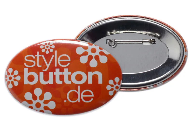 ovaler Button mit Sicherheitsnadel