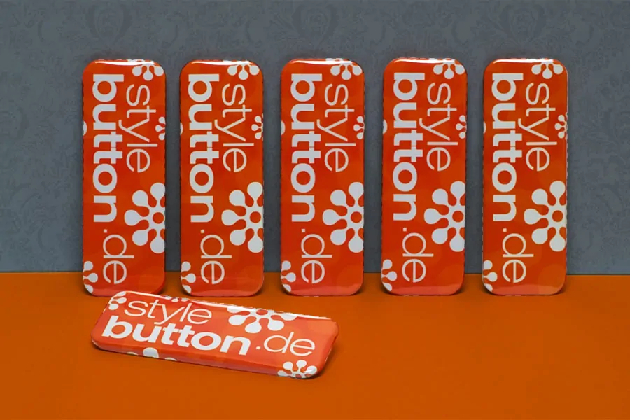 6 Stück bedruckte Buttons: rechteckig 70 x 25 mm